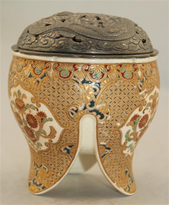 A Japanese Satsuma pottery tripod koro and a similar baluster vase, Meiji period, 13cm. (2)